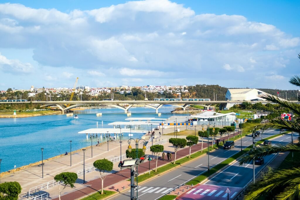 Scenic view of Rabat's waterfront showcasing modern bridge architecture and blue skies.